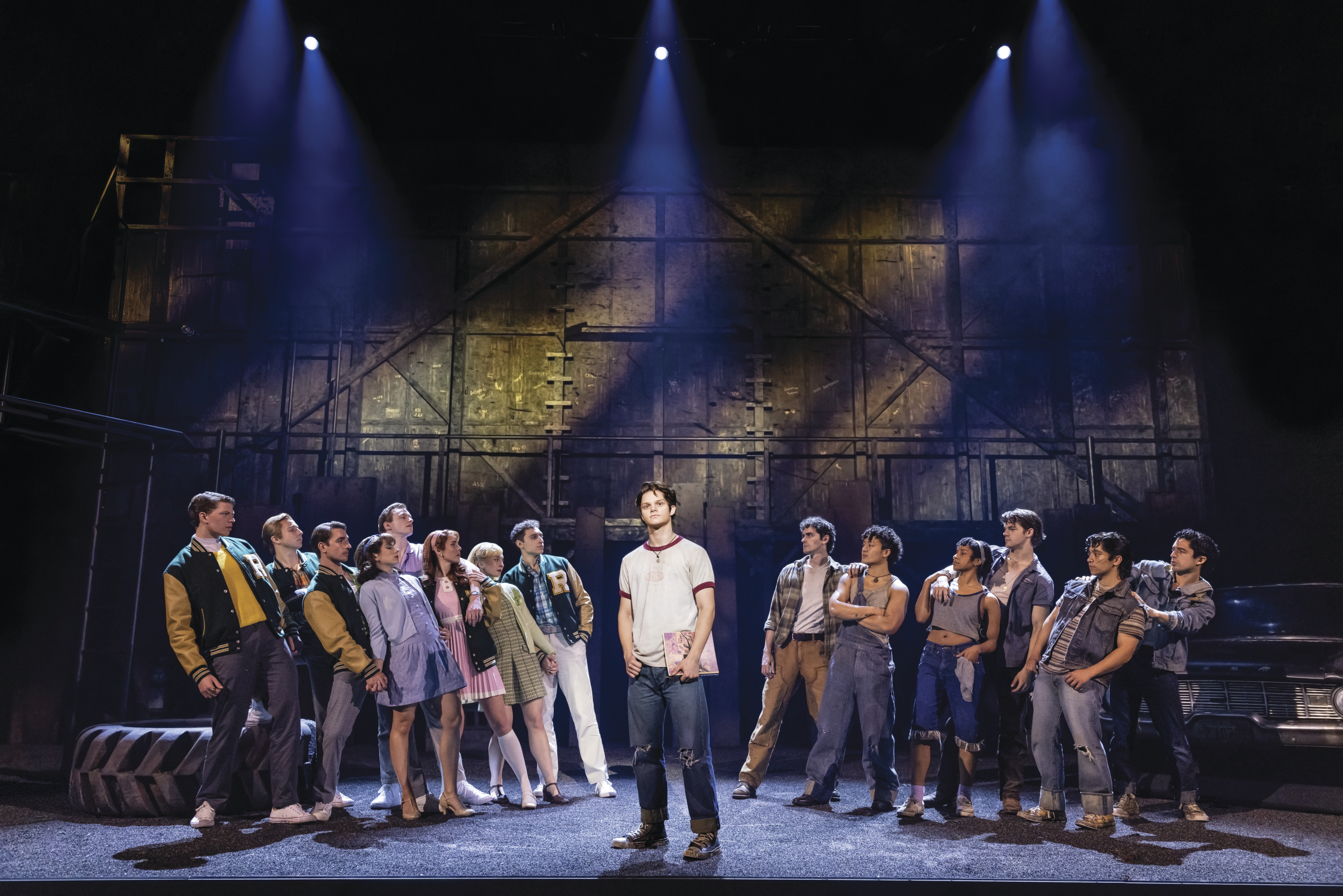 A scene from musical production of "The Outsiders".
