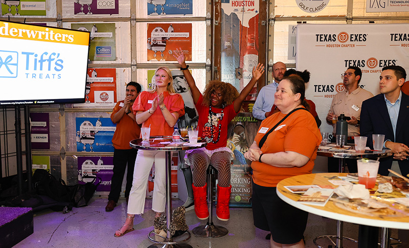 Longhorns celebrate at the Texas Exes Houston Chapter Burnt Orange Bash 2026.