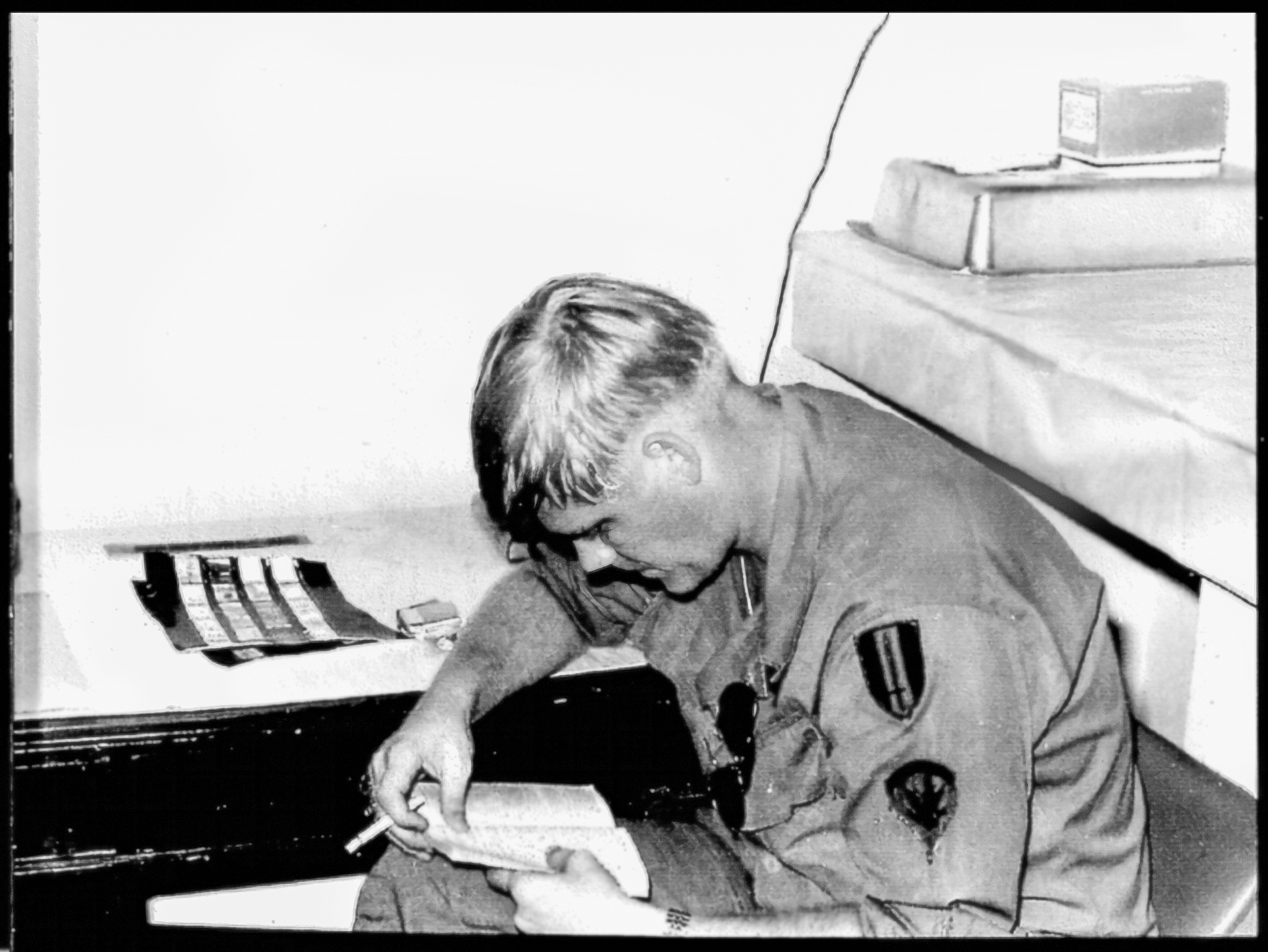 Larry-Mayo-Reading-w_-cigarette-35mm-photo-contact-sheets-on-desk-rev1-flat-web