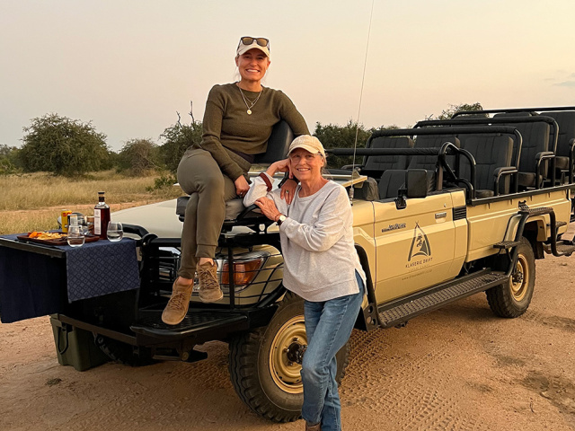 The people on safari in Africa.