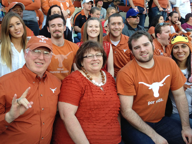 The Verheyden Family of Texas Longhorns attend a UT football game.