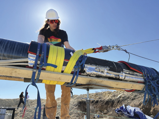 A student working on the rocket.