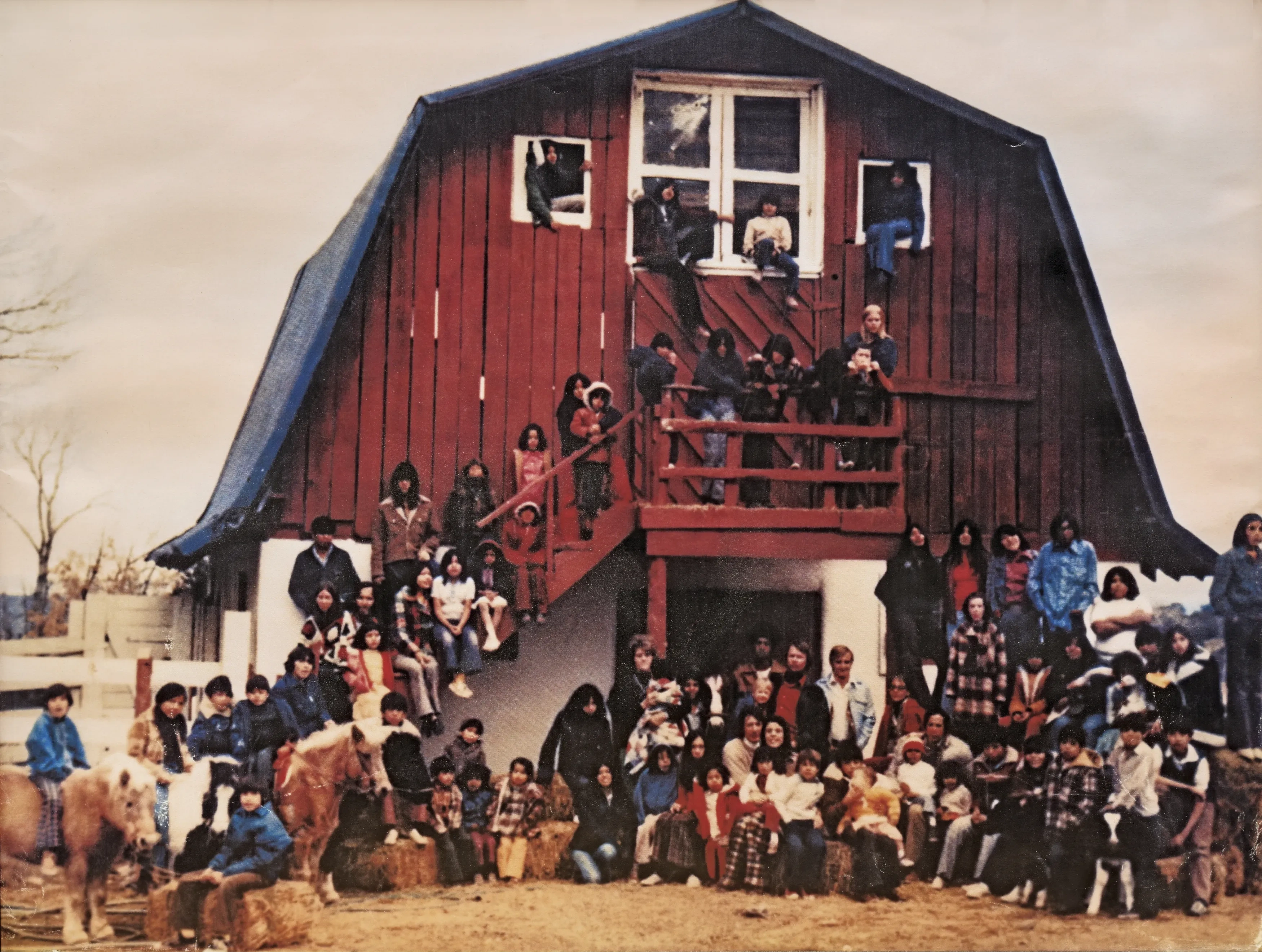 Del Conte family in front of their Taos barn. 