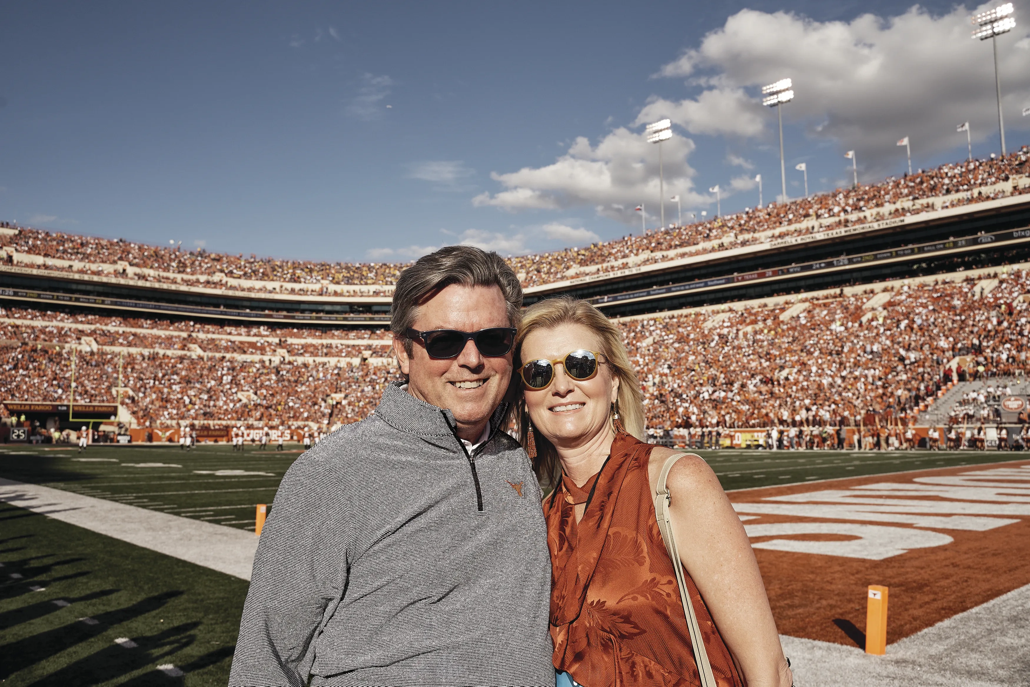 Chuck and Tamra on the sidelines