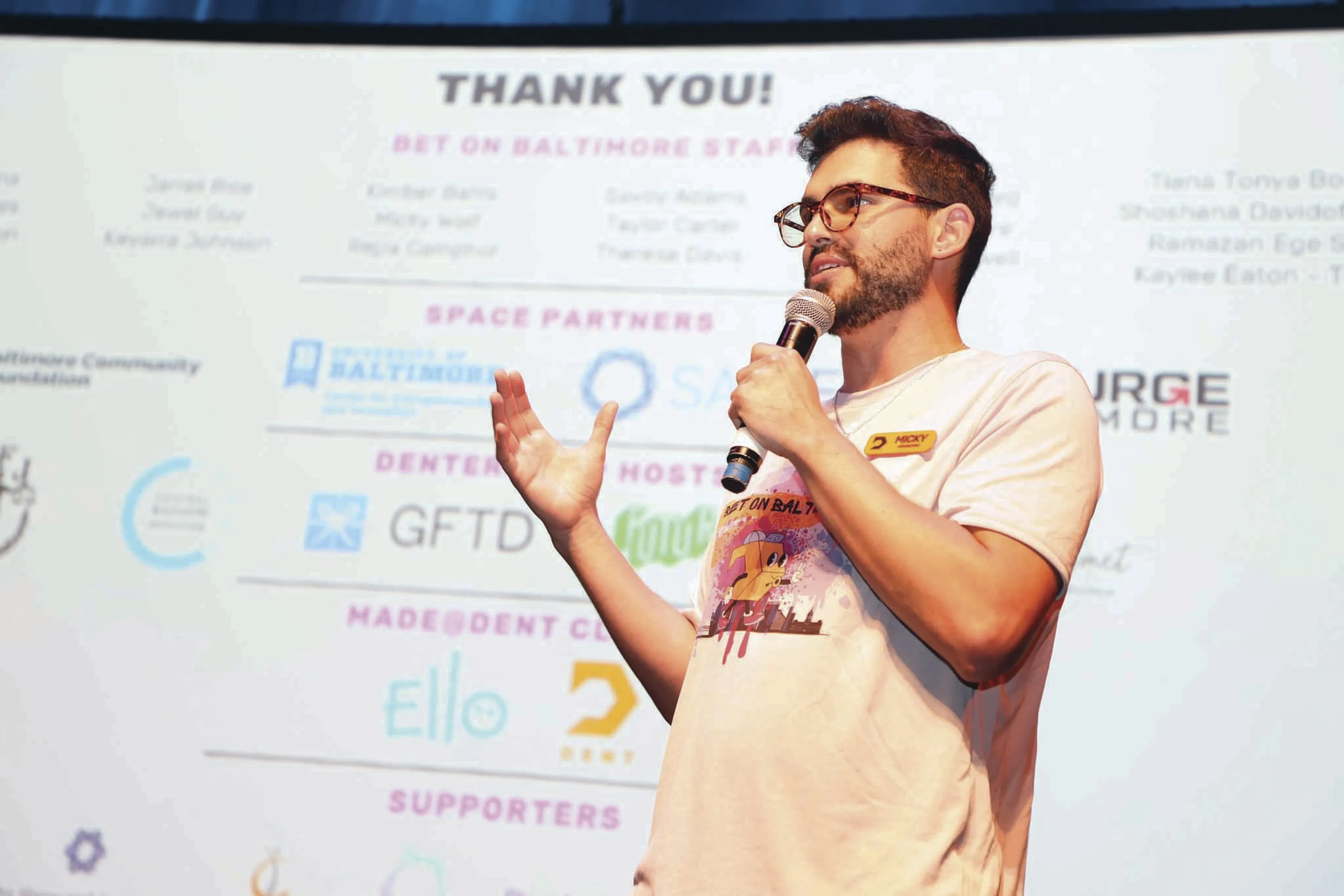 Wolf speaking at a Bet on Baltimore event