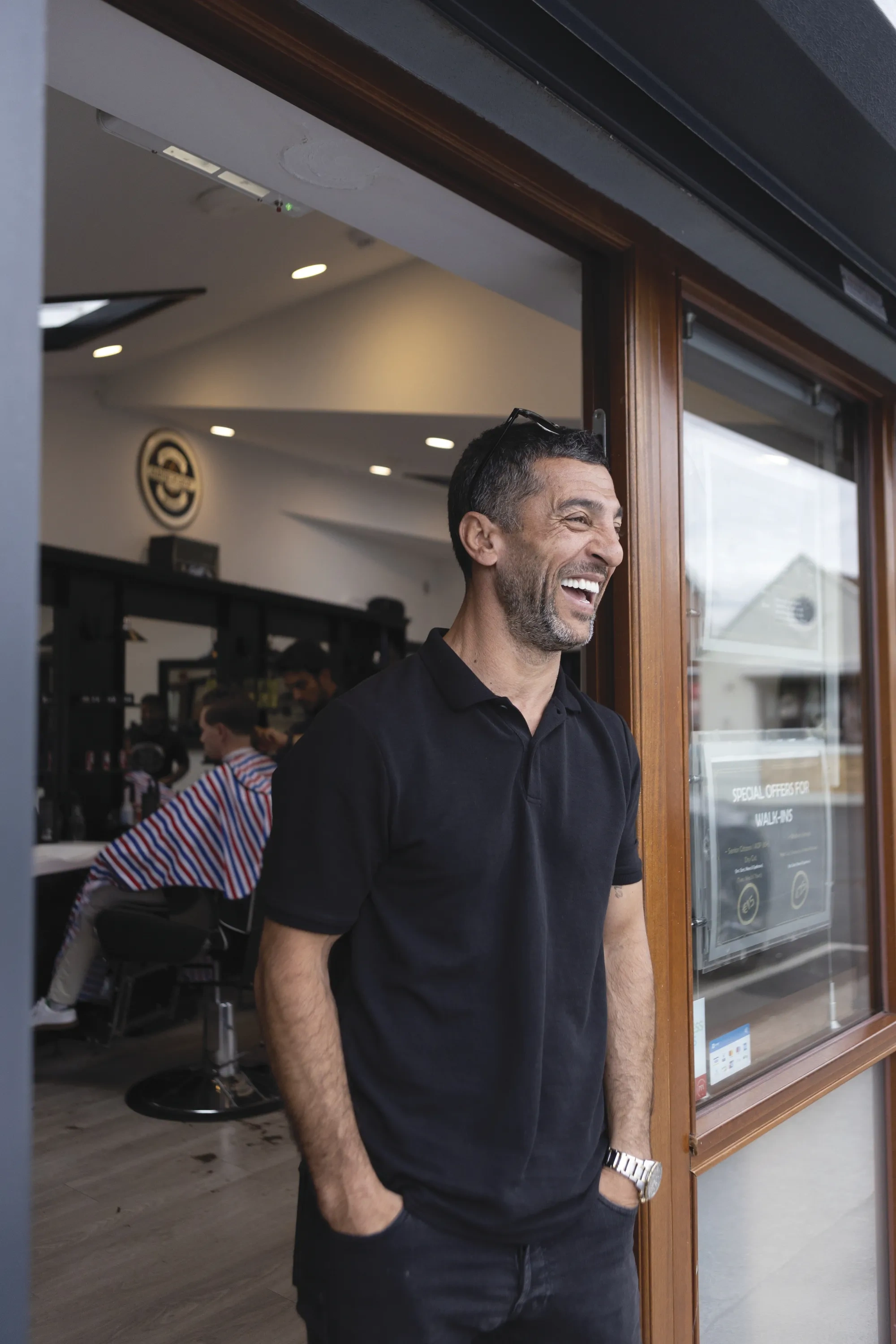 man laughing on Dublin sidewalk