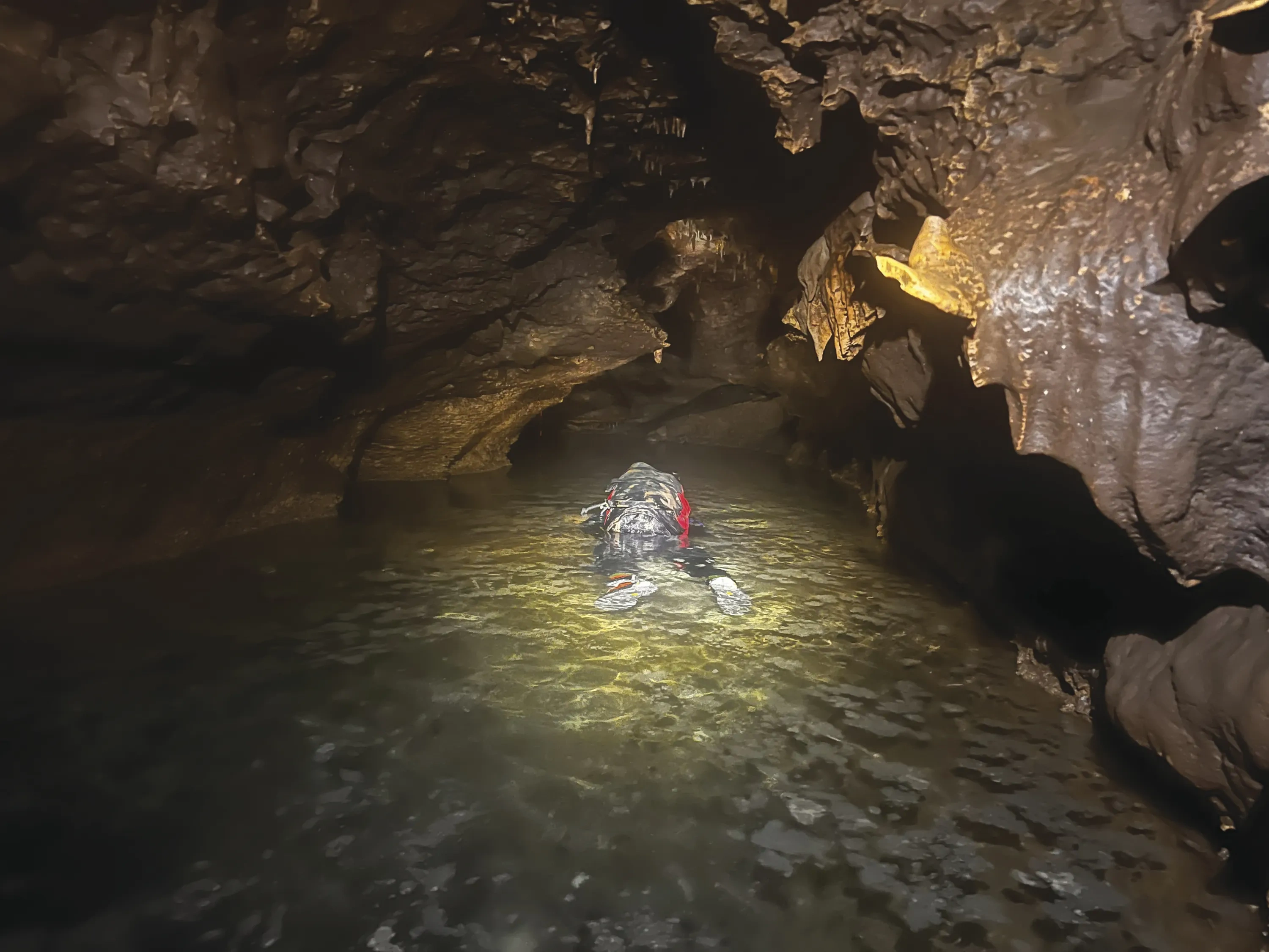 Paleontologist John Moretti descends into Bender's Cave.