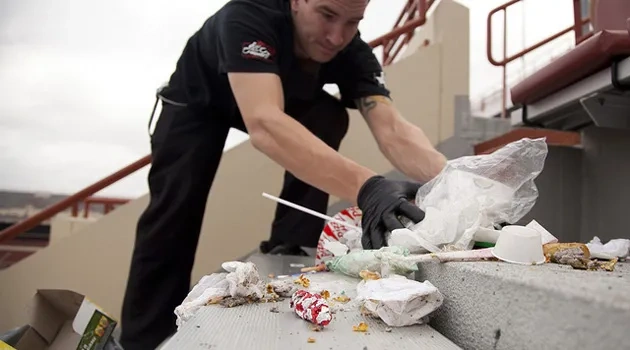 Students in Recovery Clean Up After Last Home Game