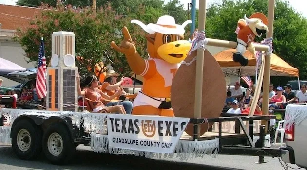 Guadalupe County Exes Show UT Pride on 4th of July Float 